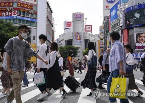 사진: 일본거리모습= 13일 현지 공영방송 NHK에 따르면 이날 일본의 코로나19 확진자는 오후 6시 10분까지 1,387명이 새로 파악됐다.